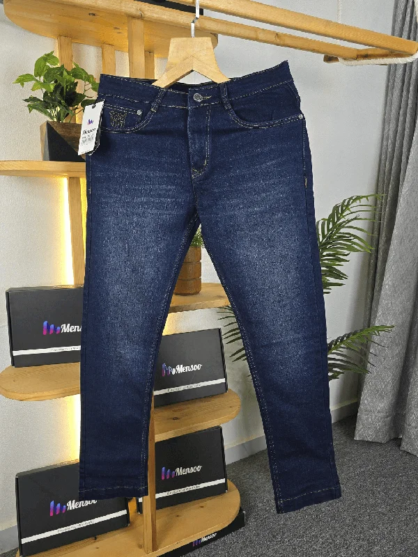 Leather Patch Embellished Men's JeansDark Blue wash jeans in your favourite ankle fit