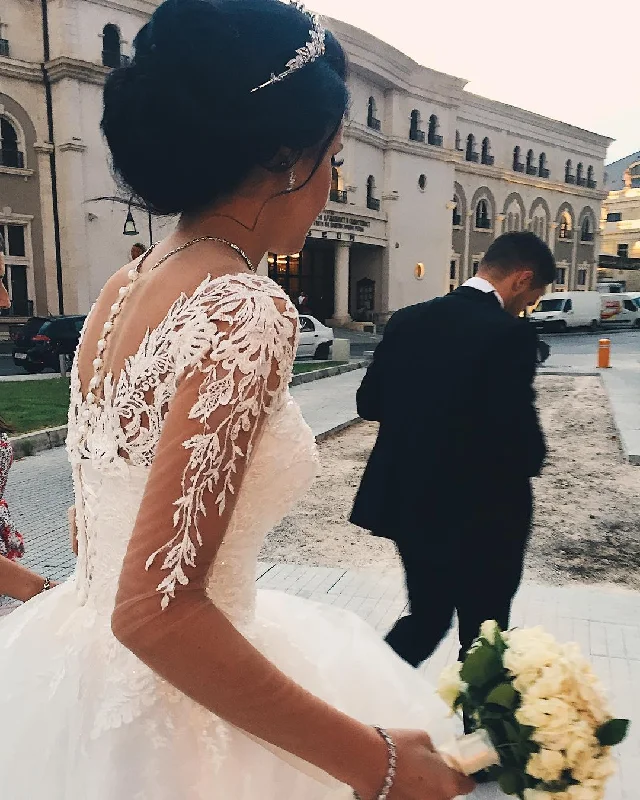 women's travel dressesSexy See Through Princess Appliques Long Sleeves Tulle Wedding Dresses Bridal Ball Gowns women's travel dressesSexy See Through Princess Appliques Long Sleeves Tulle Wedding Dresses Bridal Ball Gowns